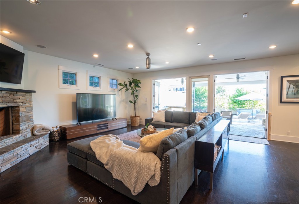 562 24th Place Hermosa Beach, CA 90254 - Photo 6 of 75 a living room with furniture and a flat screen tv