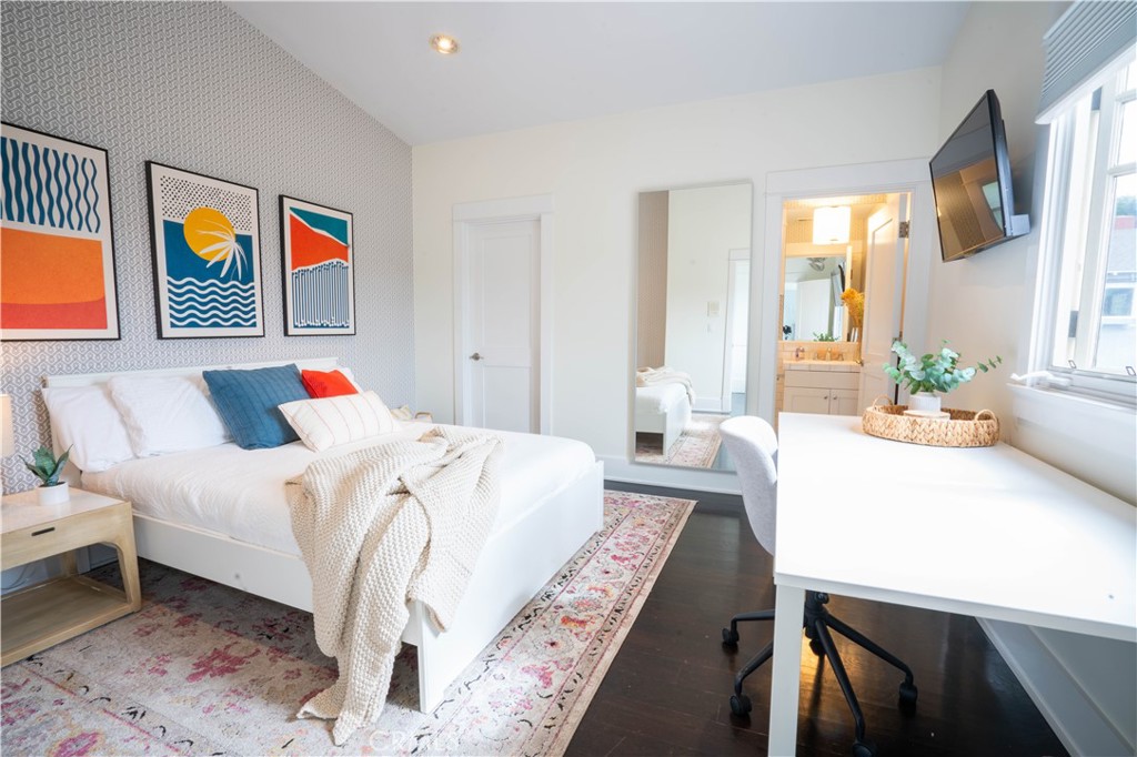 562 24th Place Hermosa Beach, CA 90254 - Photo 62 of 75 a bed sitting in a bedroom next to a window