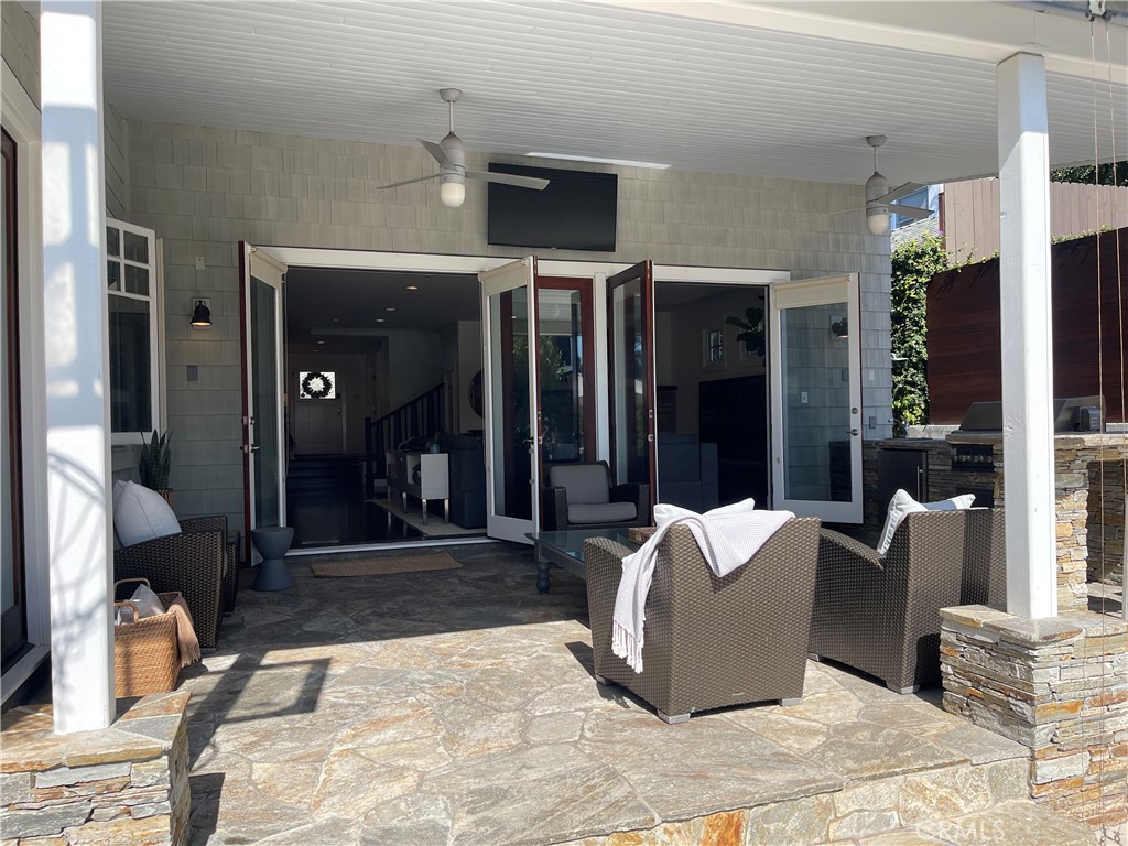 562 24th Place Hermosa Beach, CA 90254 - Photo 64 of 75 a living room with furniture and a ceiling fan