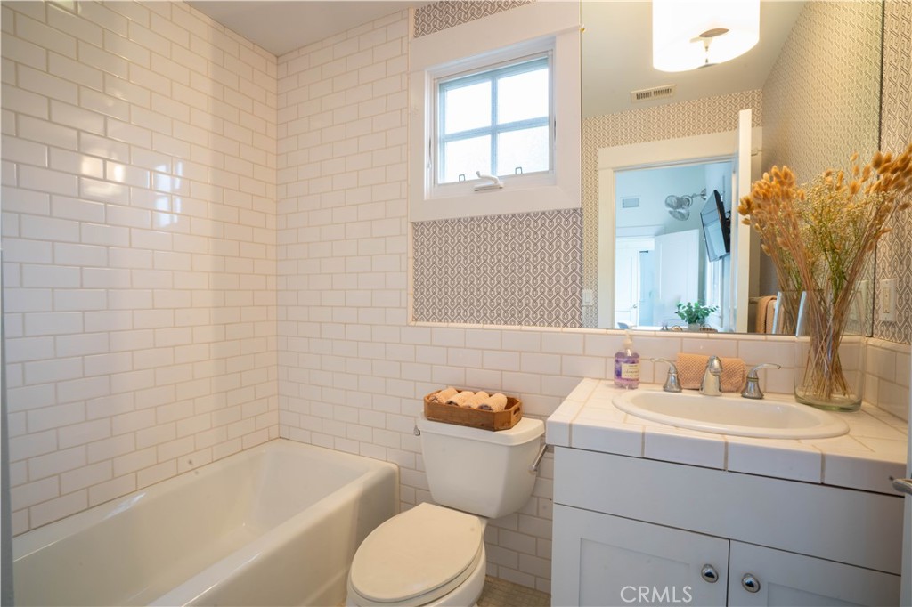 562 24th Place Hermosa Beach, CA 90254 - Photo 69 of 75 a bathroom with a sink toilet and shower