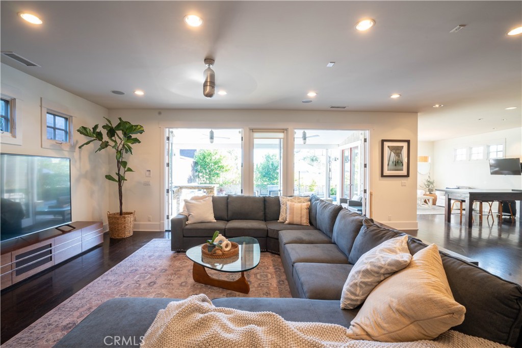 562 24th Place Hermosa Beach, CA 90254 - Photo 7 of 75 a living room with furniture and a flat screen tv