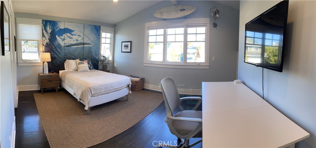 562 24th Place Hermosa Beach, CA 90254 - Photo 75 of 75 a bedroom with a bed chair and a large window
