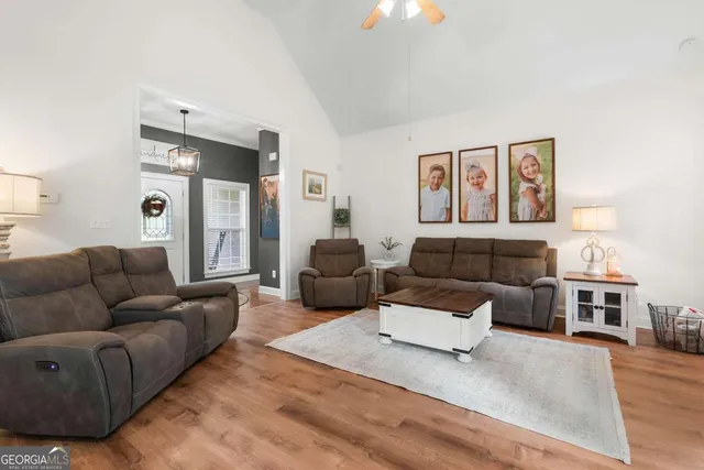 a living room with furniture and a couch