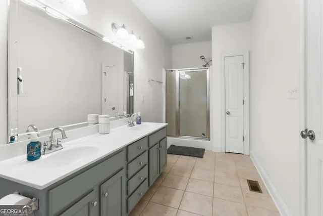 a room with lots of stuff and hardwood floor