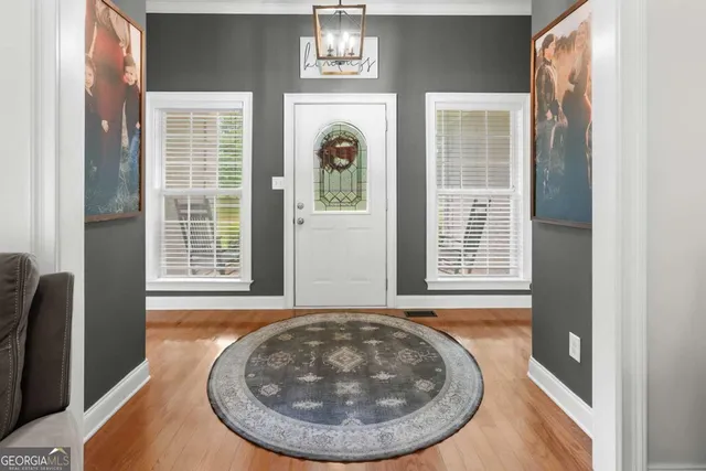 a view of a bedroom with windows
