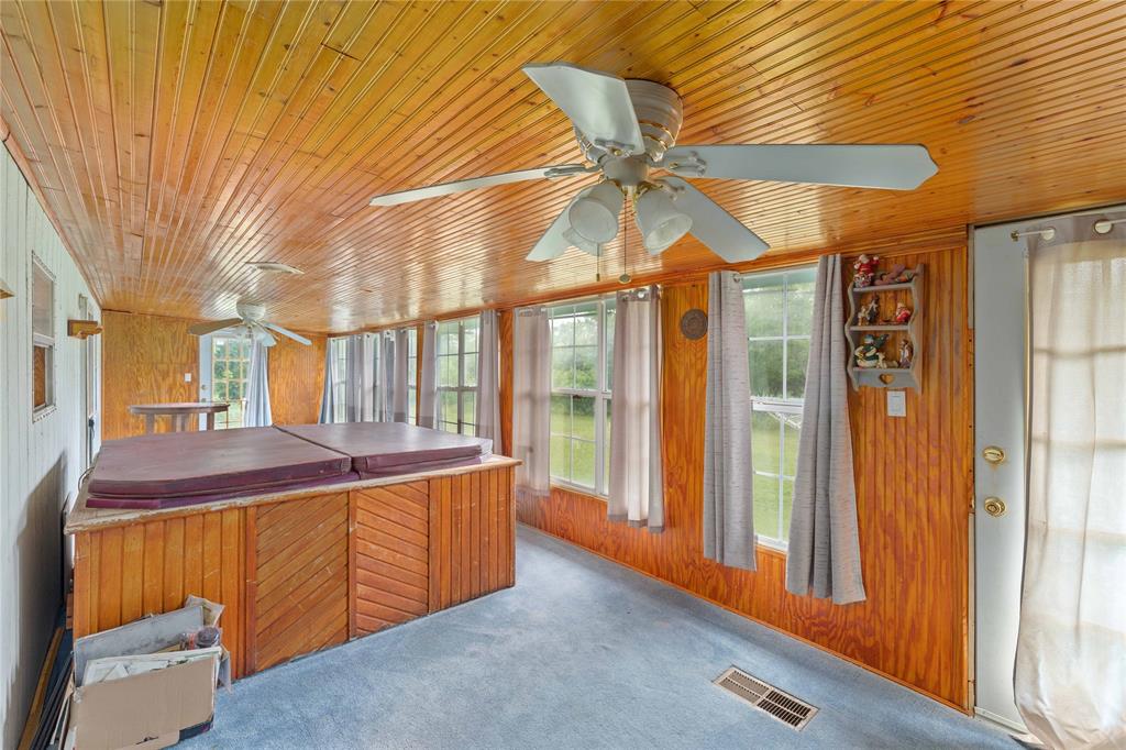 210 7th Street Blanket, TX 76432 - Photo 20 of 33 a dining room with a window and chandelier