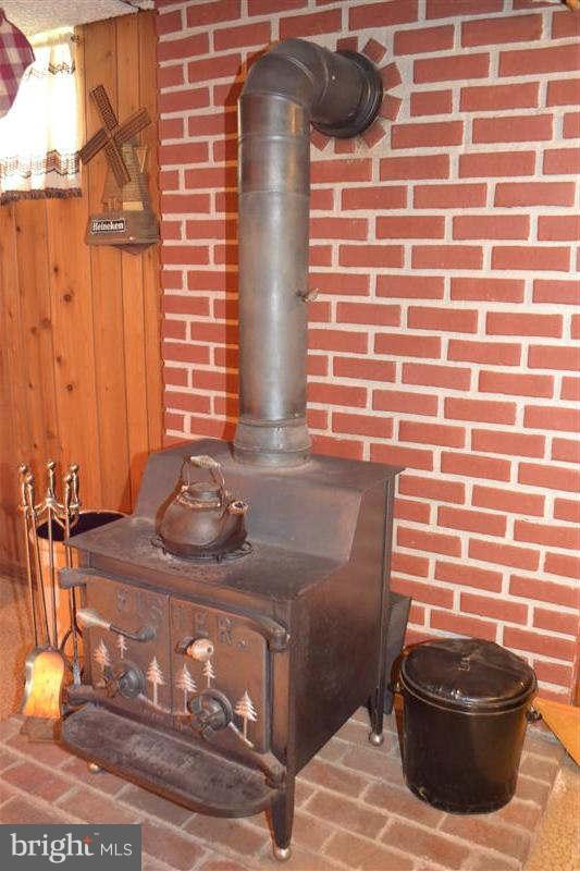727 Medway Road Hagerstown, MD 21740 - Photo 25 of 30 Wood Stove in Rec Room
