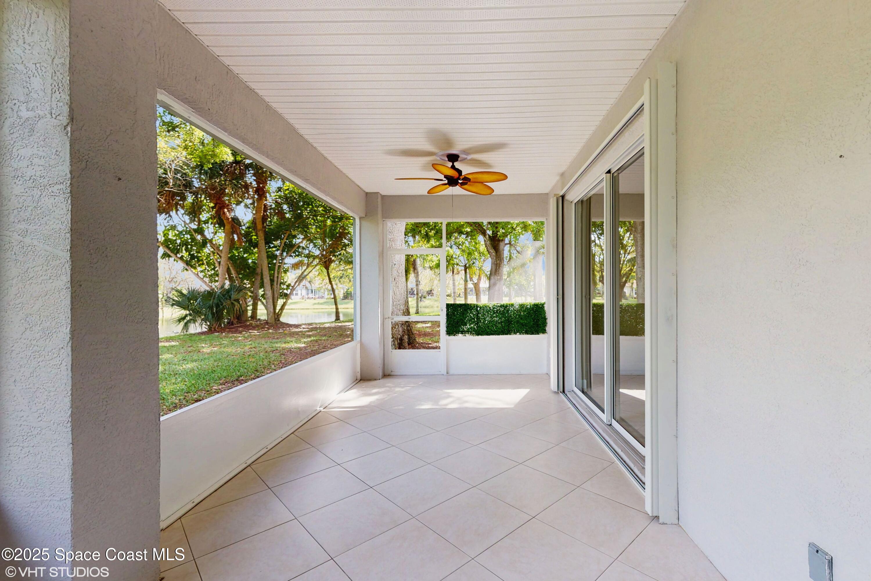 652 Hatteras Court Southwest Vero Beach, FL 32968 - Photo 29 of 48 a view of a porch and garden
