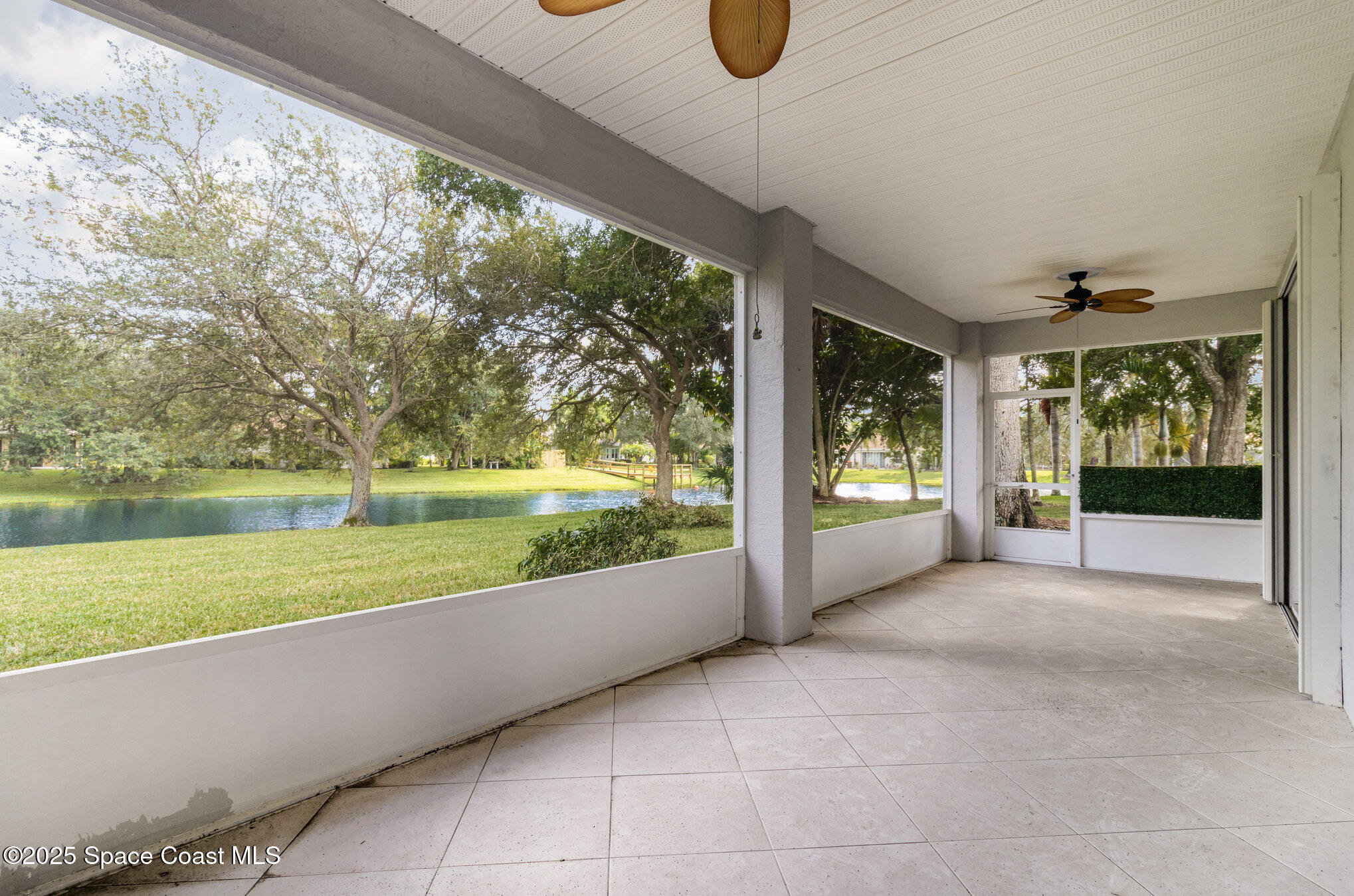 652 Hatteras Court Southwest Vero Beach, FL 32968 - Photo 31 of 48 a view of a garden with an outdoor seating space
