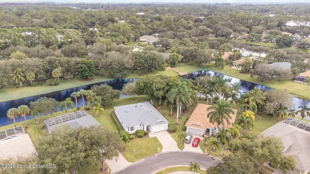 an aerial view of a swimming pool with outdoor space