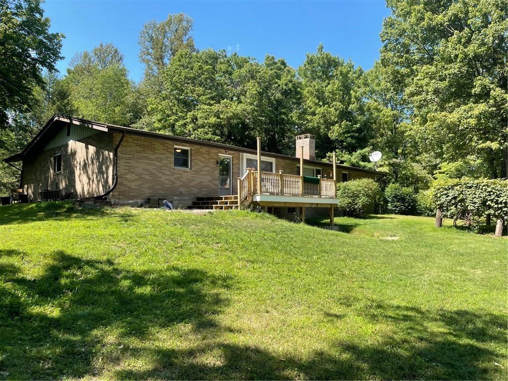 673 Dinco Road Derry, PA 15627 - Photo 3 of 21 a backyard of a house with table and chairs