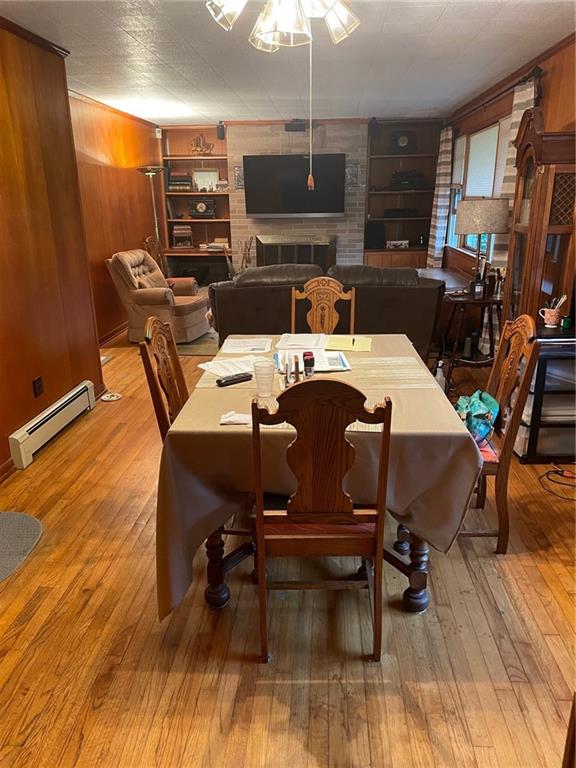 673 Dinco Road Derry, PA 15627 - Photo 9 of 21 a view of a dining room with furniture wooden floor and chandelier