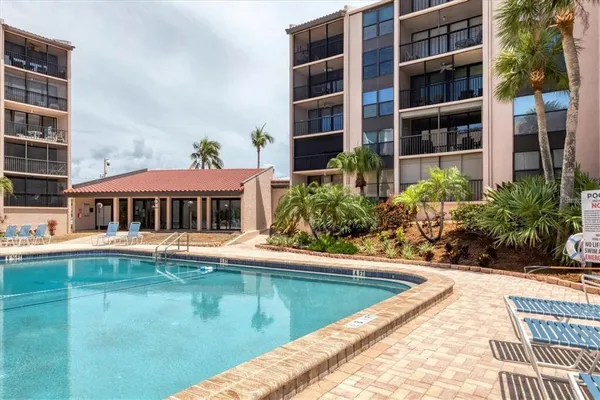 a view of a house with swimming pool