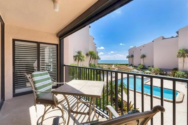 a view of a balcony with an outdoor space