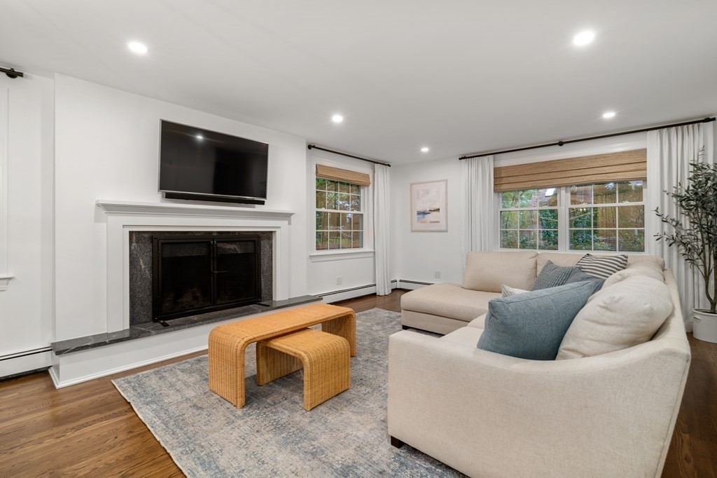 29 Martin Road Wellesley, MA 02481 - Photo 12 of 29 a living room with furniture and a fireplace