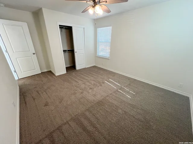a bathroom with a sink a toilet and bathtub