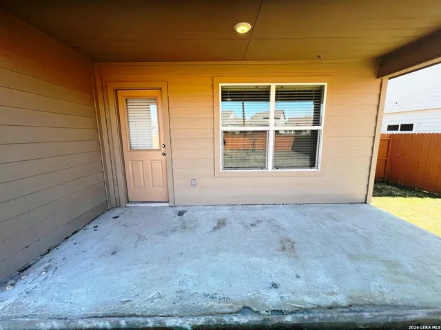 a view of a backyard of a house