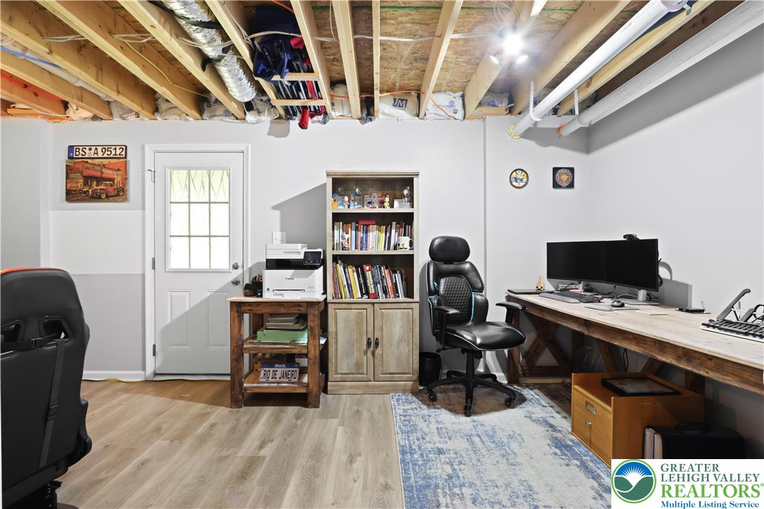 2336 Alex Road Easton, PA 18040 - Photo 21 of 35 A well-lit unfinished basement provides a versatile space for an office or recreation.