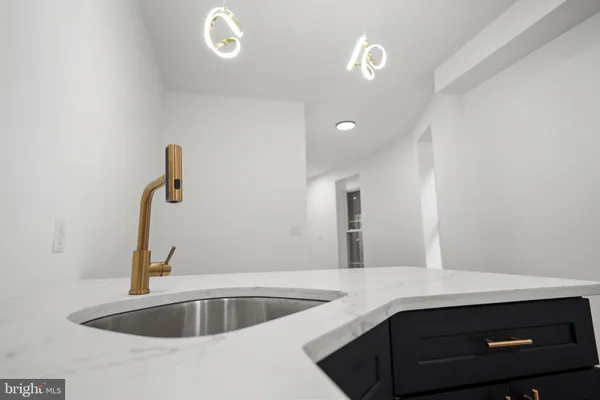 a kitchen with a sink and dishwasher