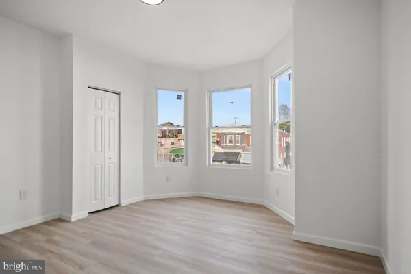 an empty room with windows