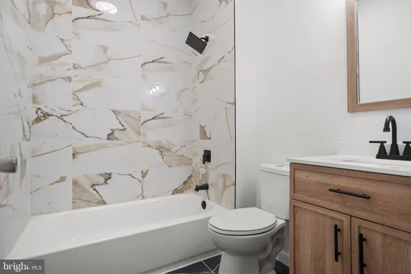 a bathroom with a sink and a toilet