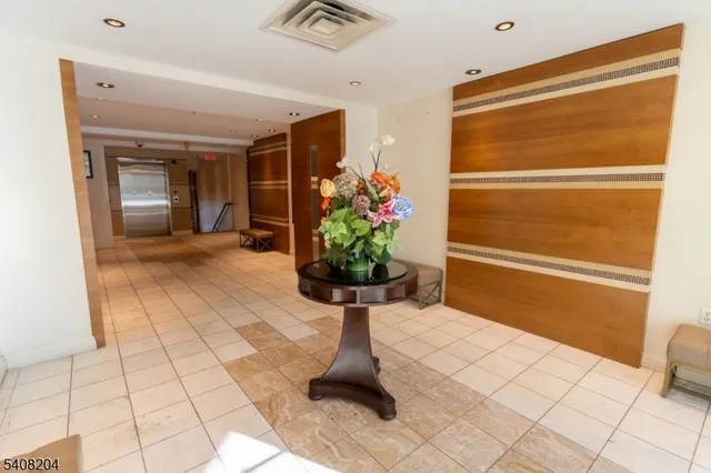 a vase of flowers sitting on a table