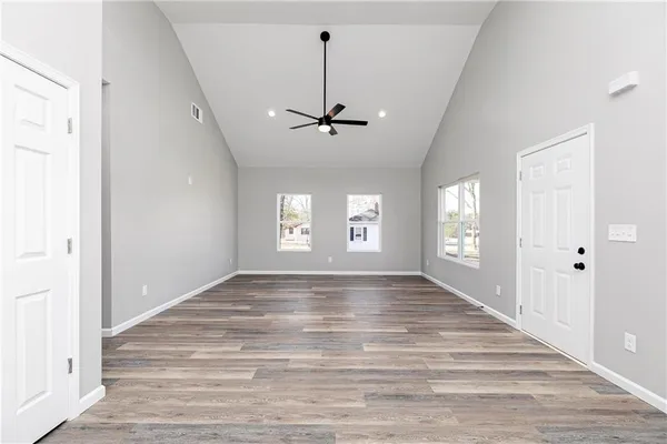 a view of an empty room with a window
