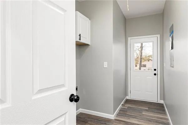 a view of small space with wooden floor