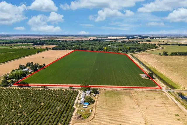 a view of a golf course with a lake