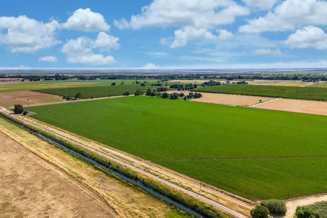 an aerial view of a houses with outdoor space