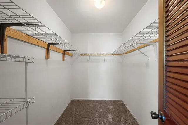 a view of small space with racks on the wall