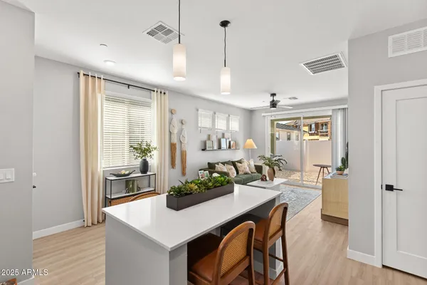 a view of a kitchen and dining room