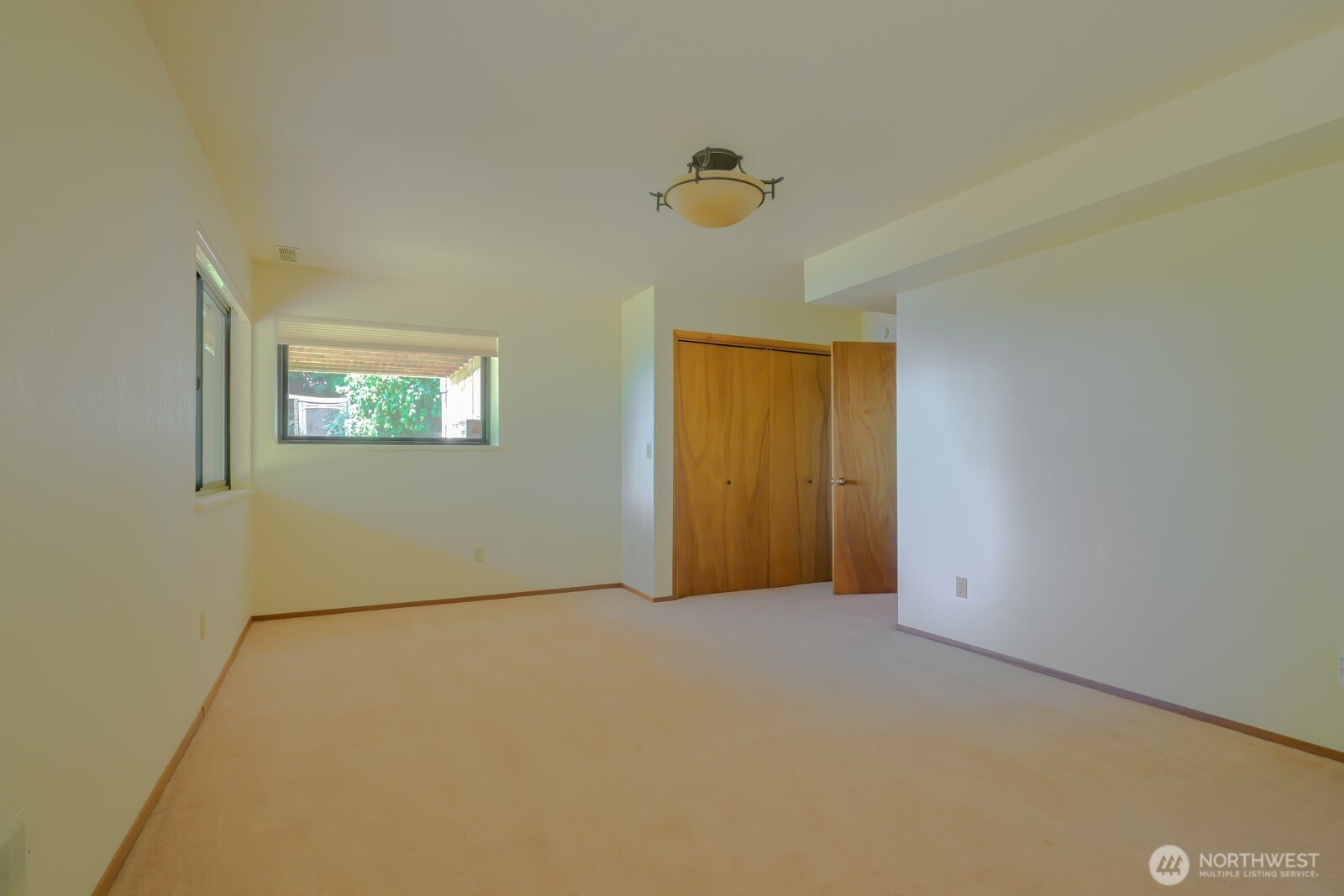 241 Gustavson Road Quilcene, WA 98376 - Photo 20 of 32 an empty room with windows