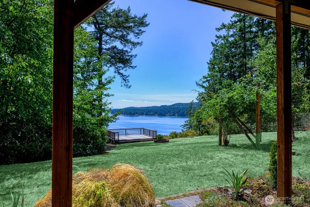 a view of backyard with green space