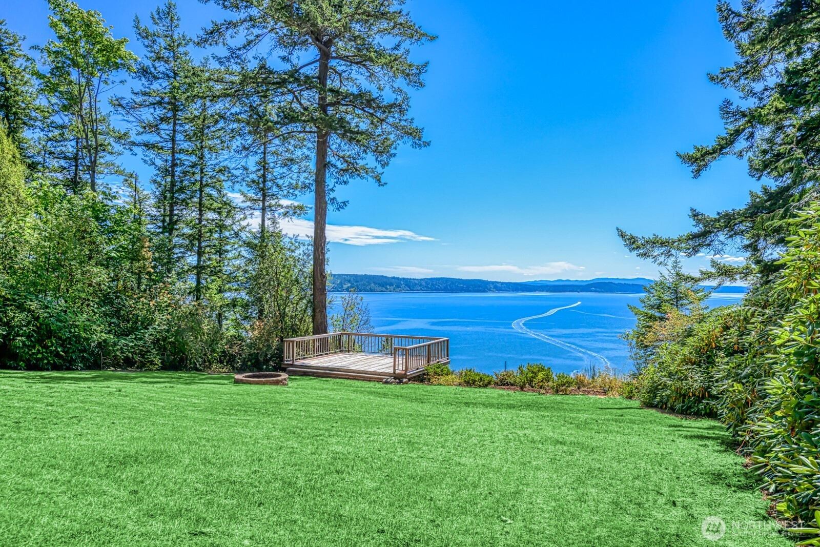 241 Gustavson Road Quilcene, WA 98376 - Photo 25 of 32 a view of a garden with an tree