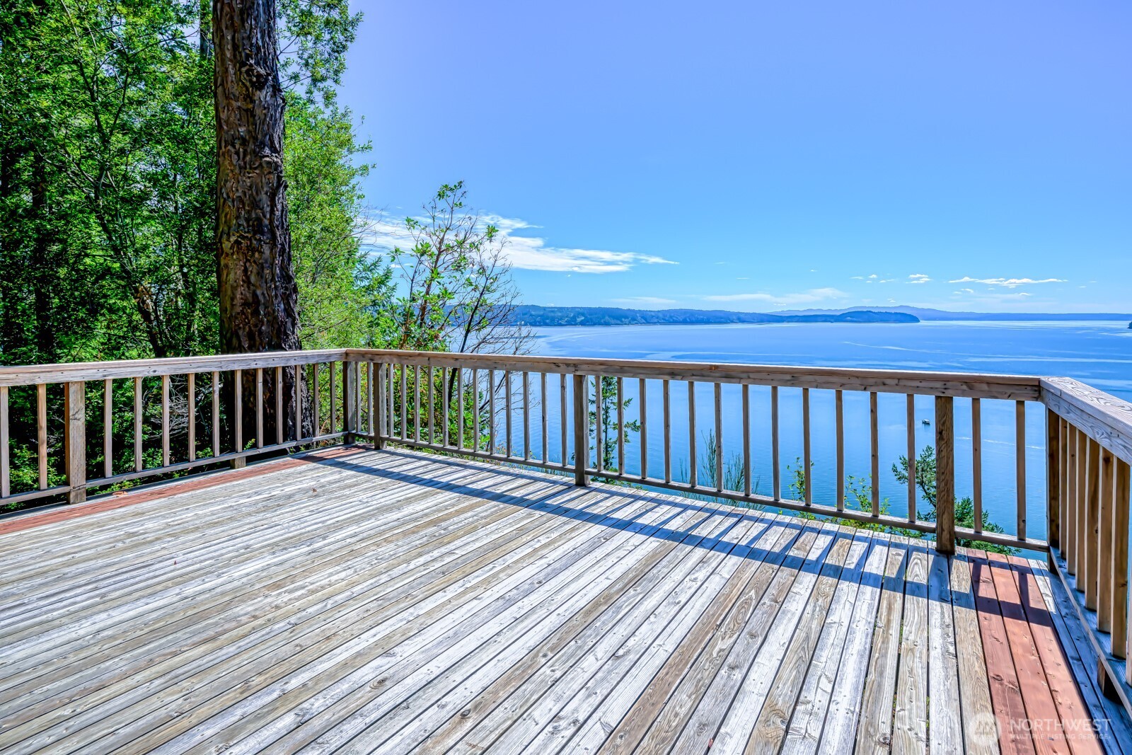 241 Gustavson Road Quilcene, WA 98376 - Photo 26 of 32 a view of deck with wooden floor and fence