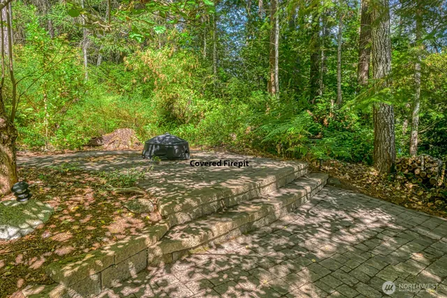 a backyard of a house with lots of green space