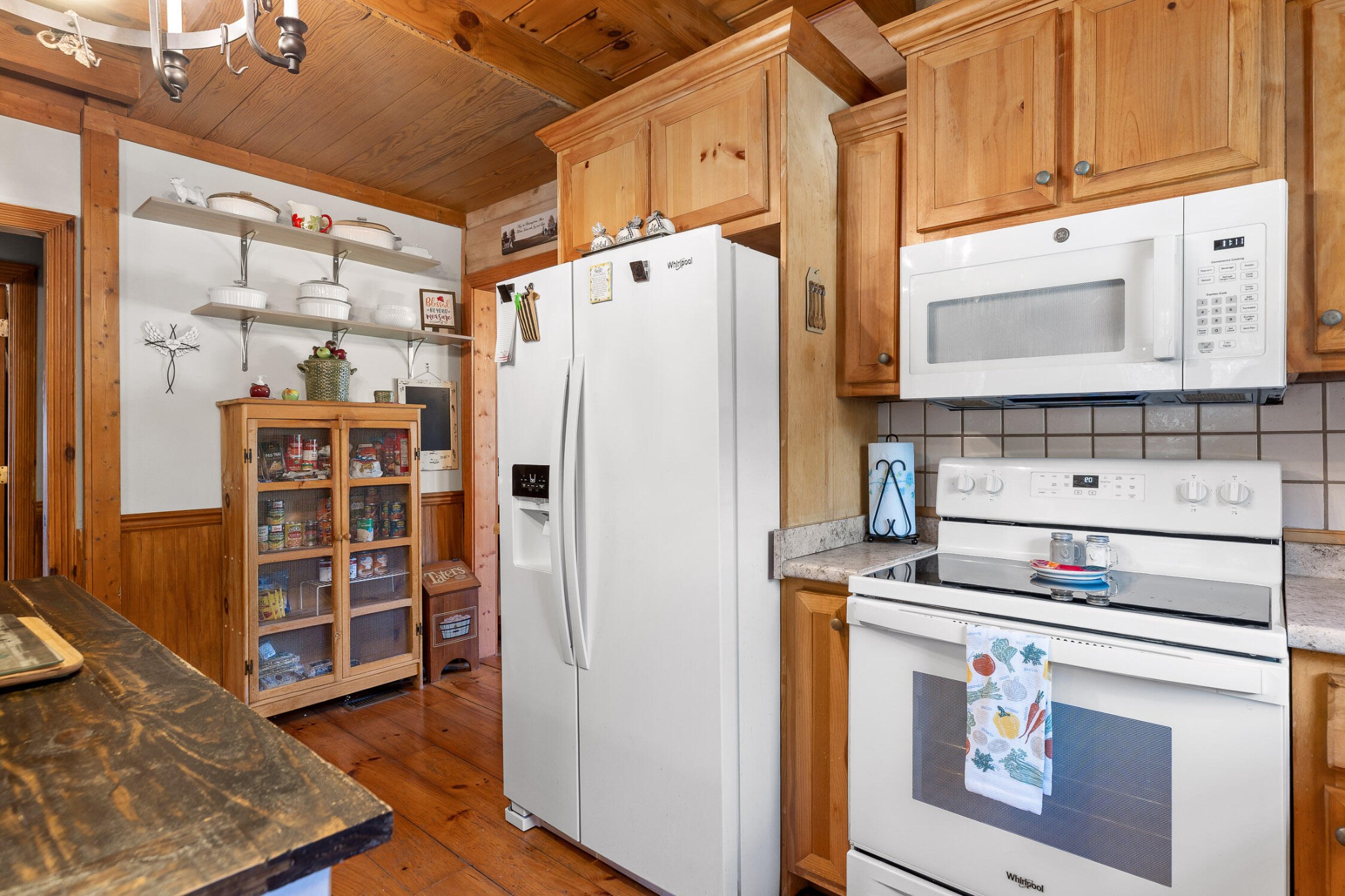 3382 Back Valley Road Trenton, GA 30752 - Photo 12 of 45 a kitchen with stainless steel appliances a refrigerator and cabinets