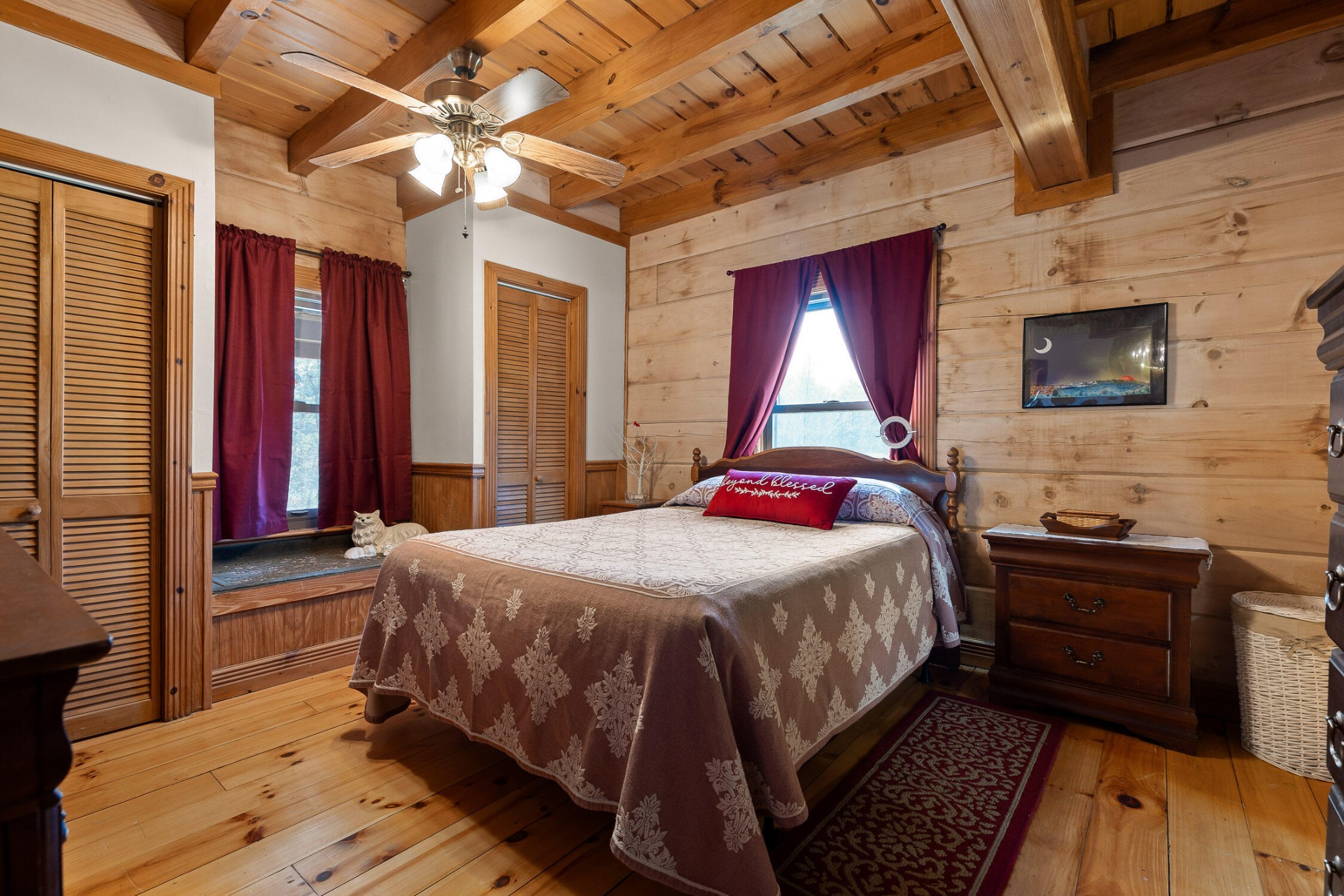 3382 Back Valley Road Trenton, GA 30752 - Photo 18 of 45 a bedroom with a bed and wooden floor