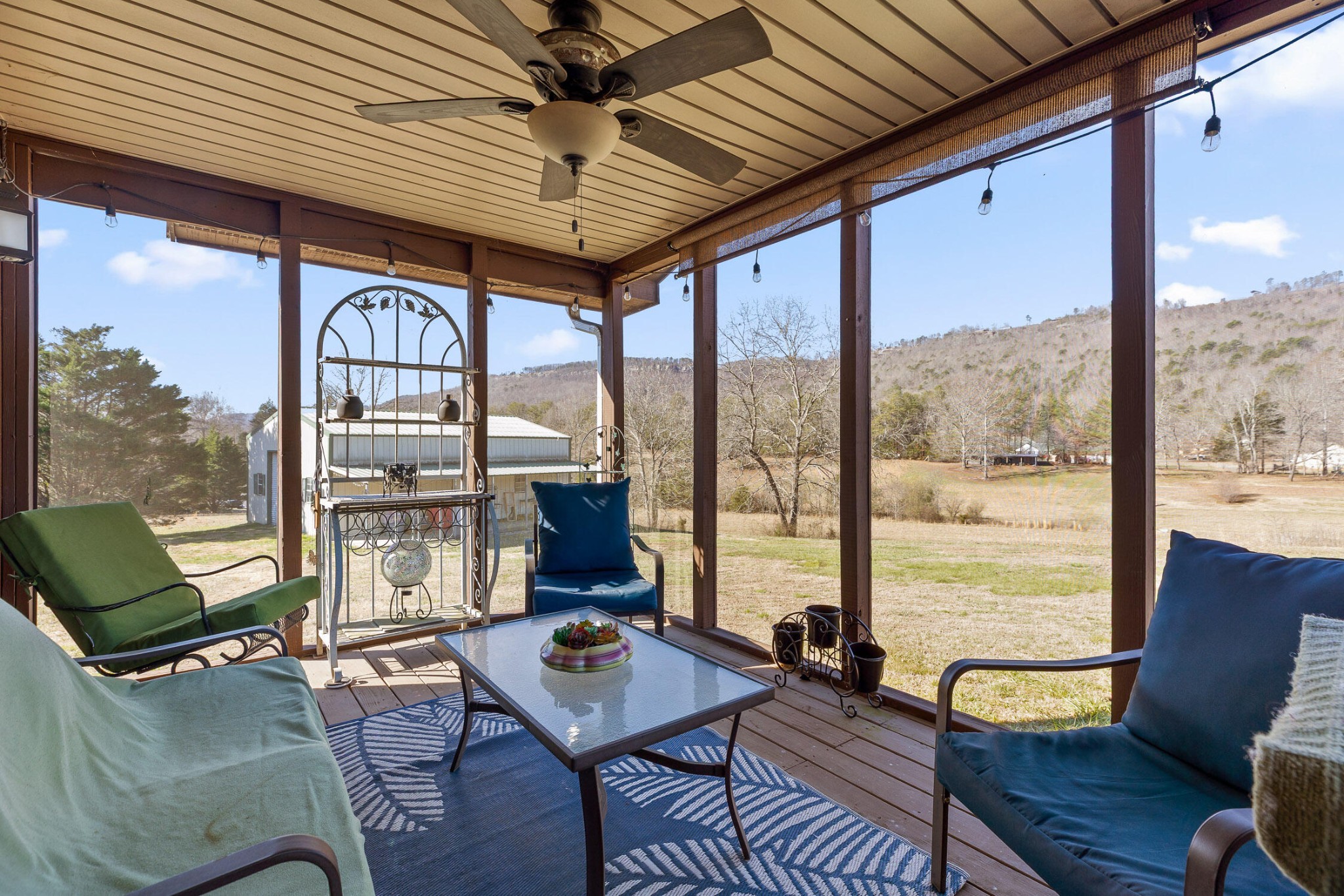 3382 Back Valley Road Trenton, GA 30752 - Photo 28 of 45 a living room with furniture a large window with wooden floor