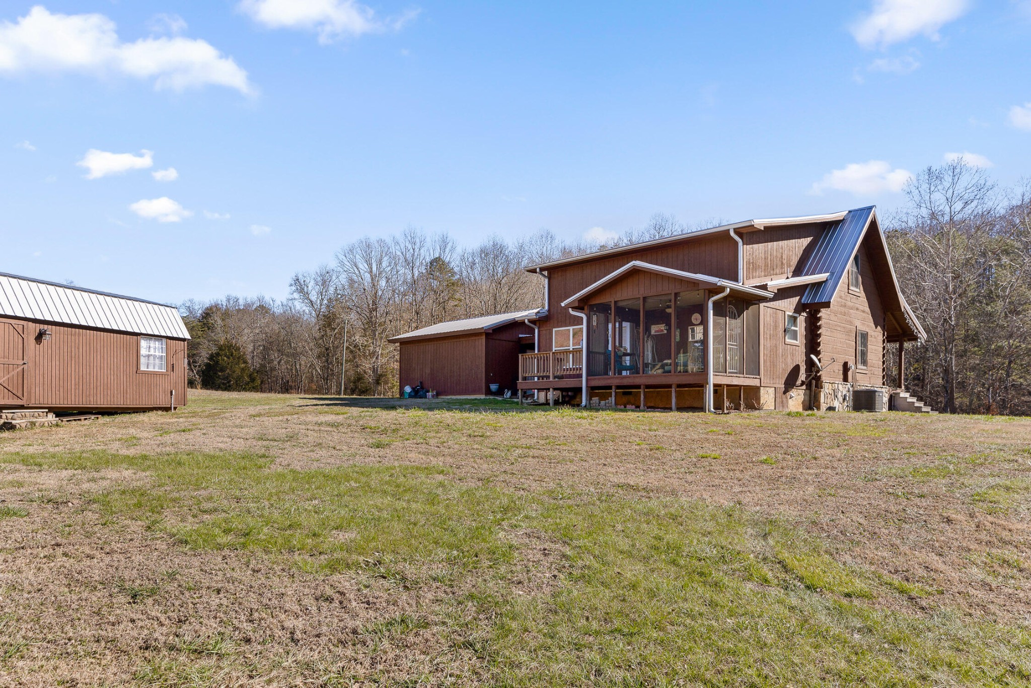 3382 Back Valley Road Trenton, GA 30752 - Photo 31 of 45 a front view of house with yard and trees in the background