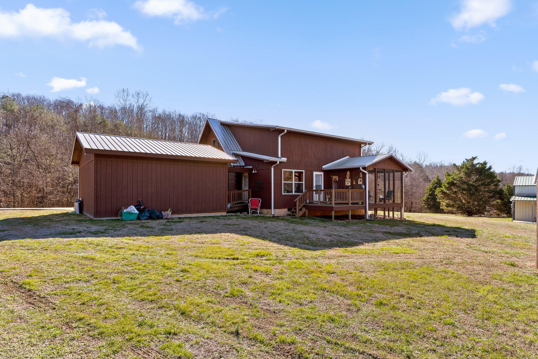 3382 Back Valley Road Trenton, GA 30752 - Photo 32 of 45 a view of a house with a yard and garage