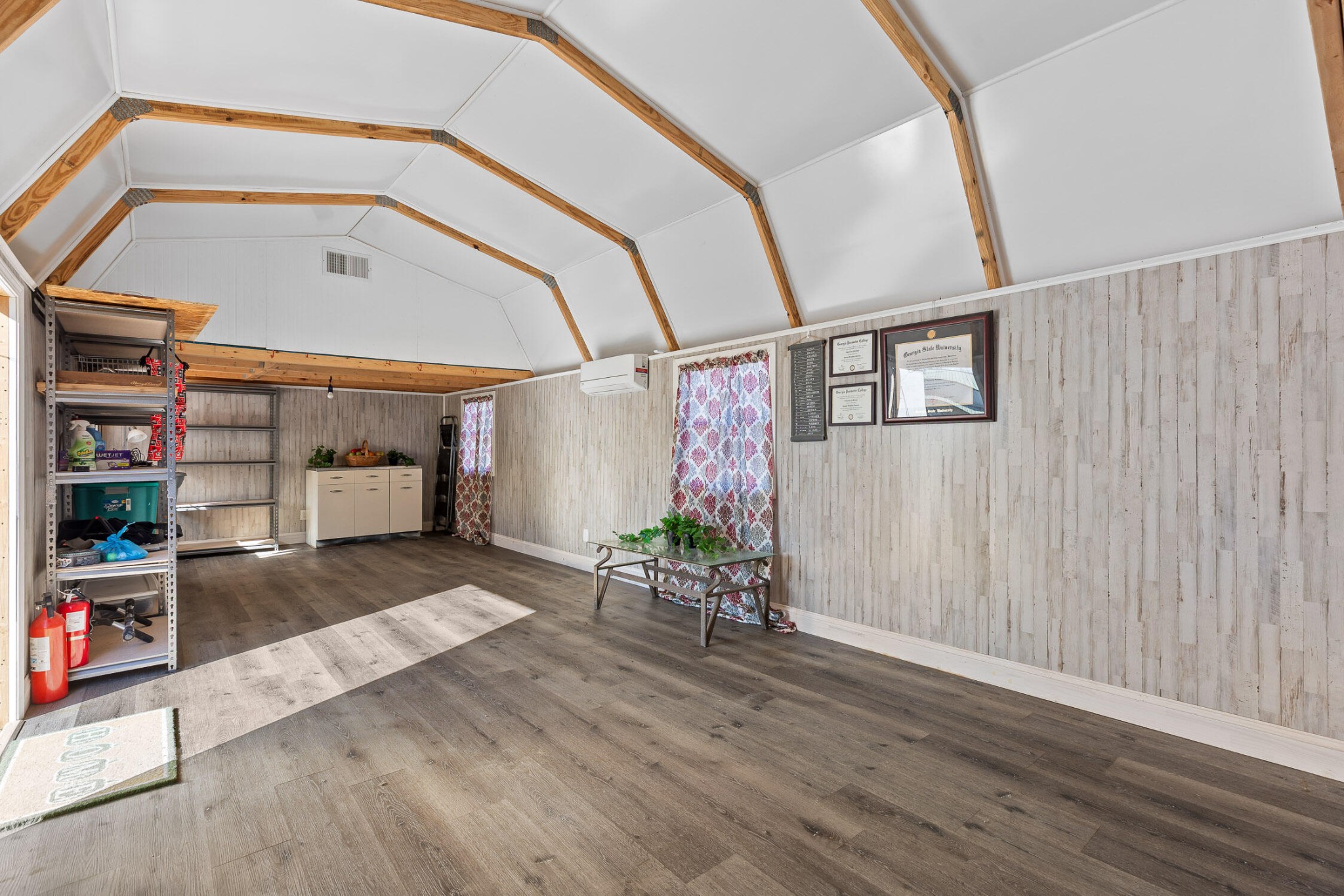 3382 Back Valley Road Trenton, GA 30752 - Photo 34 of 45 an empty room with wooden floor and windows