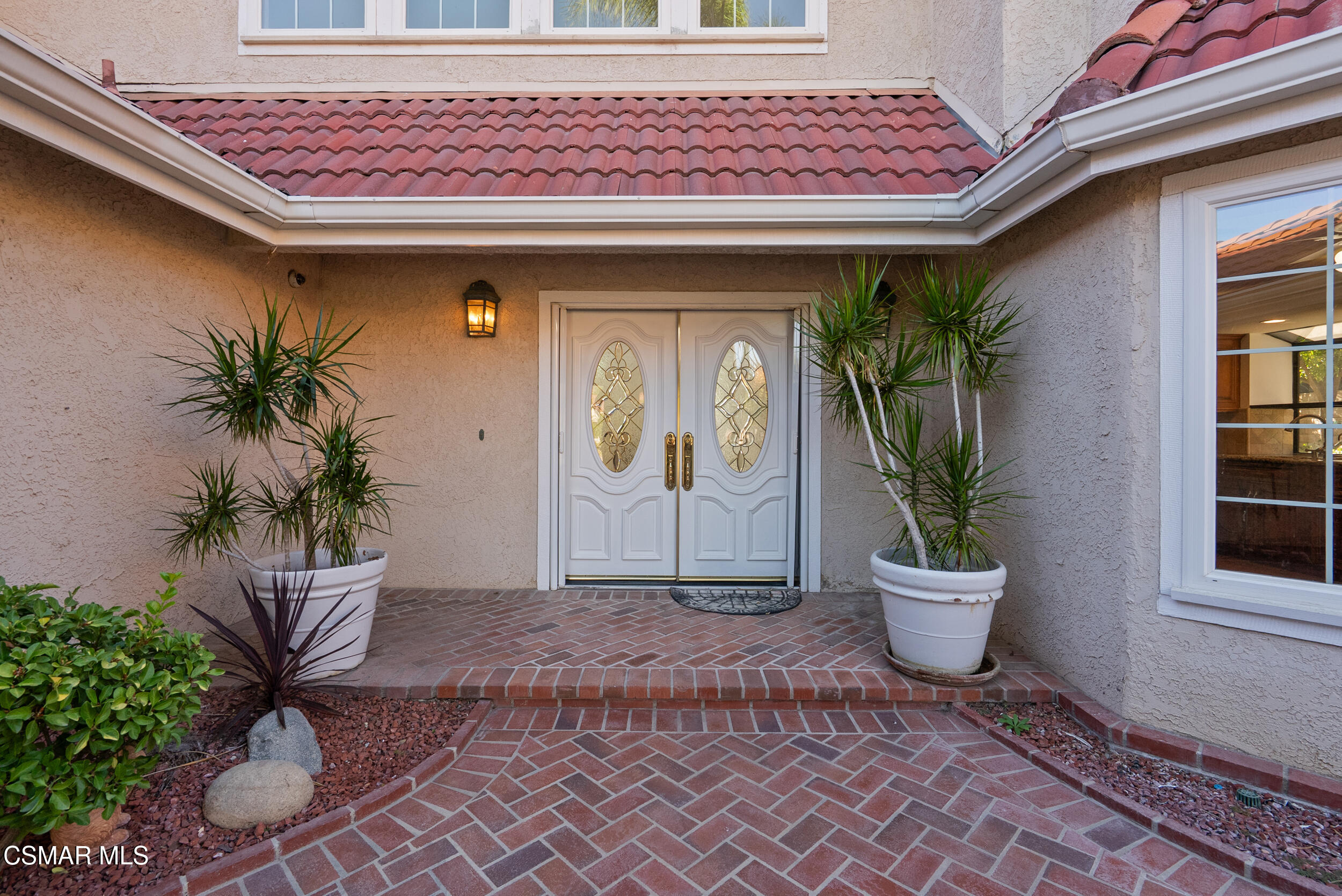 5206 Seneca Place Simi Valley, CA 93063 - Photo 25 of 92 a front view of a house with garden