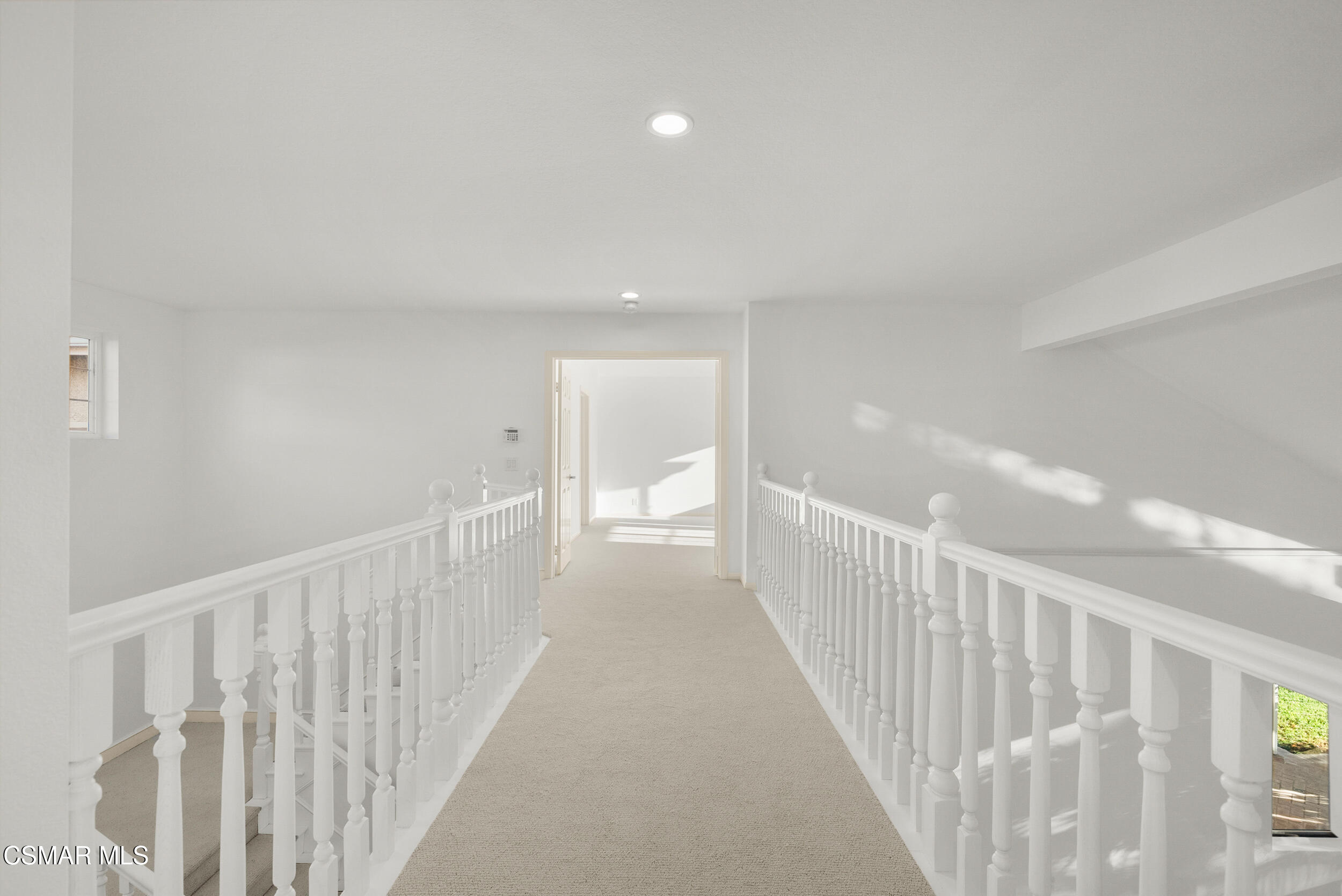 5206 Seneca Place Simi Valley, CA 93063 - Photo 62 of 92 a view of a hallway with white walls