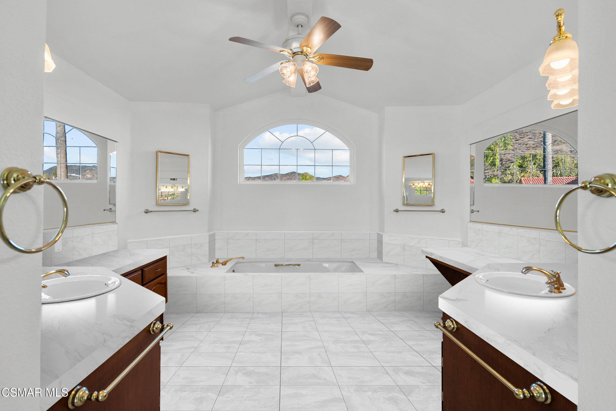 5206 Seneca Place Simi Valley, CA 93063 - Photo 71 of 92 a bathroom with a tub sink and mirror
