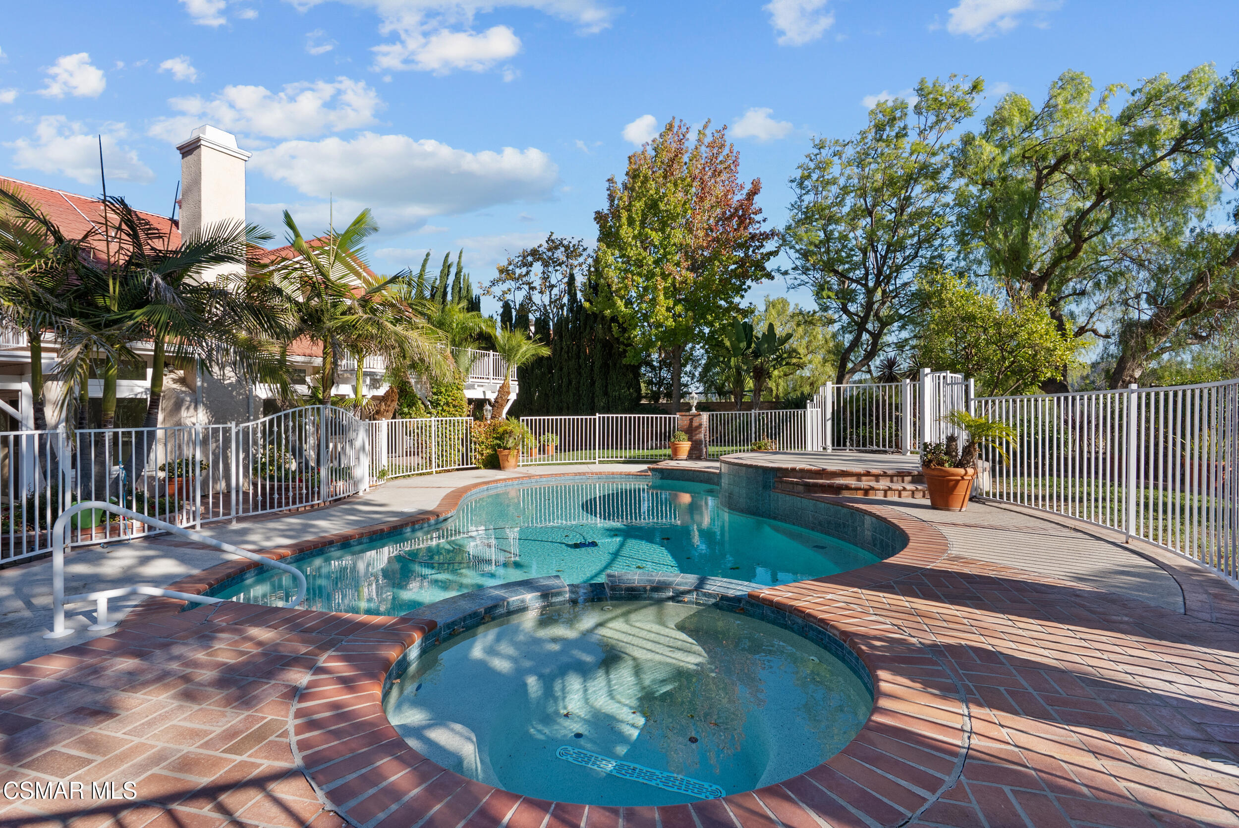 5206 Seneca Place Simi Valley, CA 93063 - Photo 87 of 92 a view of a swimming pool with a sitting space