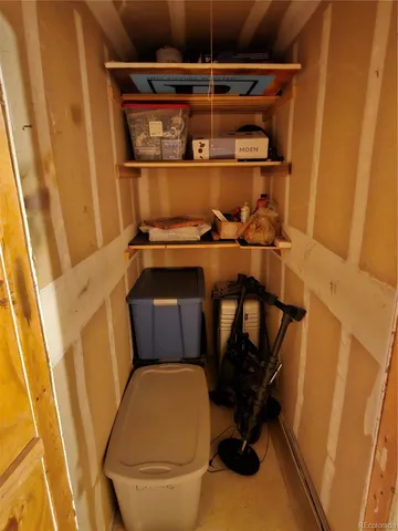 a bathroom with a toilet and a sink