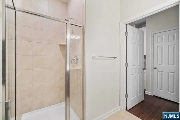 a view of a bathroom with a glass door