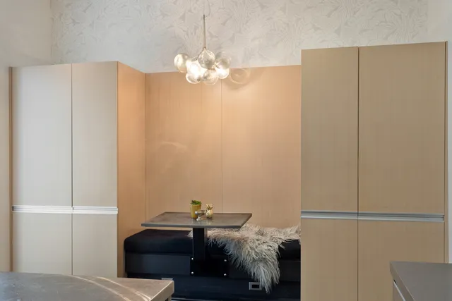a bathroom with a double vanity sink and mirror
